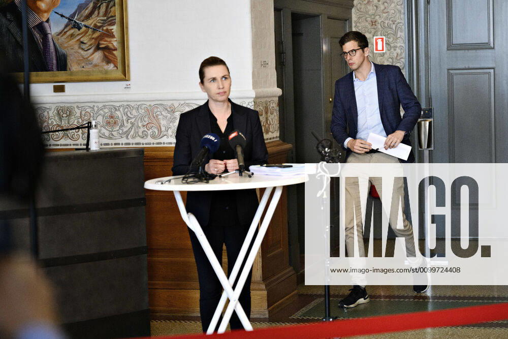 Alex Vanopslagh LA passes Prime Minister Mette Frederiksen S, who speaks to the press following a party leadership reopening in Christiansborg, Thursday, April 23, 2020 Party leaders meet on test strategy and further process ahead of phase two of the reopening of Denmark following covid 19 closures, Copenhagen Denmark,