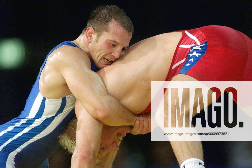Olympische Spiele Sommerspiele Sydney 2000 Ringen Freistil Herren bis 76 kg ; Goldmedaille für Alexander Leipold ( Deutschland blau ) gegen Brandon Slay ( USA Rot )