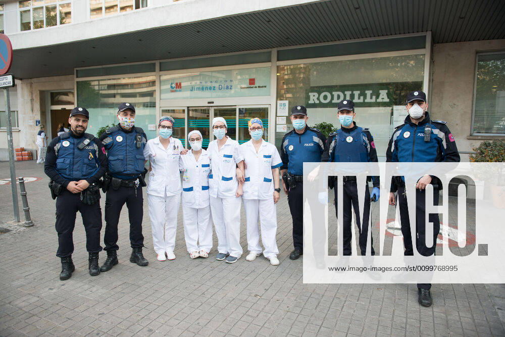 Municipal Police poses for photo with health during the tribute to the health workers at the Hospital Fundacion Jimenez Diaz during the Covid-19 pandemic on April 23, 2020 in Madrid, Spain Madrid SPAIN - ZUMAa181 20200423_zaa_a181_089