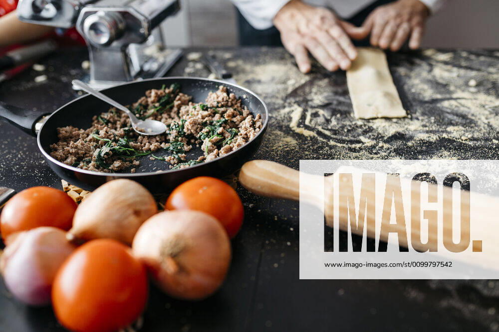 Close-up of man preparing homemade gluten free pasta model released Symbolfoto property released JRFF04310
