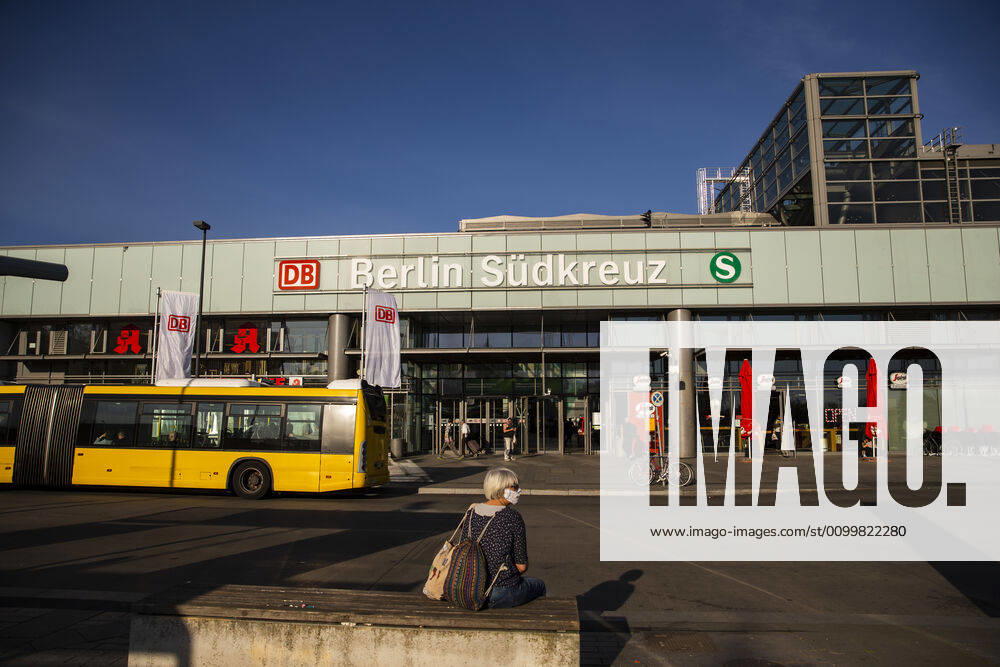 A woman with a face mask waits on the bus in front of the station Suedkreuz in Berlin on April 23, 2020 From yesterday, bookstores and car showrooms can open again under 800 square meters, with hygiene and distance regulations in place Today, there were noticeably more people on the road Coronavirus in Berlin