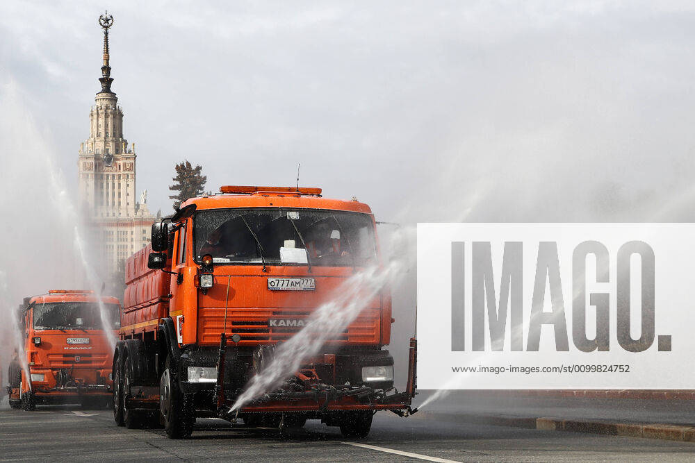 Street cleaning trucks wash with disinfectant roads in Moscow s Vorobyovy Gory Sparrow Hills amid the ongoing COVID-19 pandemic. Anton Novoderezhkin TASS TS0D6E17
