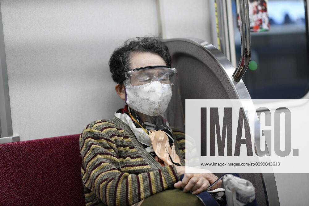 Commuter wearing face masks with face shield is seen inside of a train amid the coronavirus pandemic on Friday, April 24, 2020 in Tokyo, Japan. Japanese Prime Minister Shinzo Abe declared a nationwide State of Emergency last week to stop the spreading of the coronavirus throughout the country. (Photo: Richard Atrero de Guzman AFLO) (125672608)