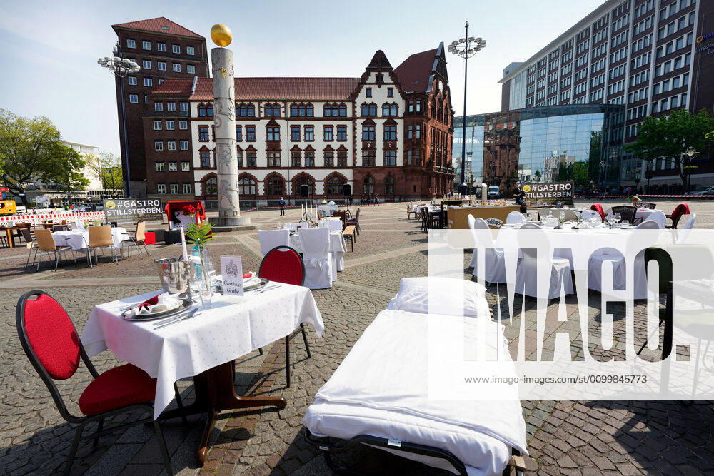 Empty tables, chairs and beds at Friedensplatz in Dortmund Following an appeal by Dehoga Deutscher Hotel und Gaststättenverband, catering businesses have joined forces under the motto STILLSTERBEN to take part in the protest action, with which they draw attention to the situation of their businesses to the consequences of the Corona restrictions in the Corona crisis
