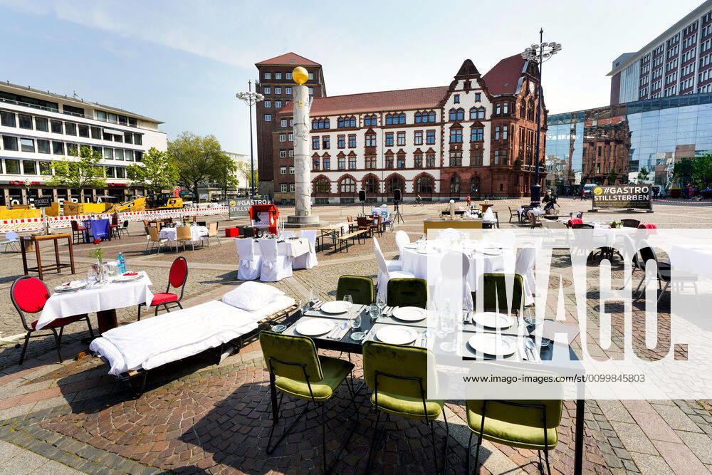 Empty tables, chairs and beds at Friedensplatz in Dortmund Following an appeal by Dehoga Deutscher Hotel und Gaststättenverband, catering businesses have joined forces under the motto STILLSTERBEN to take part in the protest action, with which they draw attention to the situation of their businesses to the consequences of the Corona restrictions in the Corona crisis