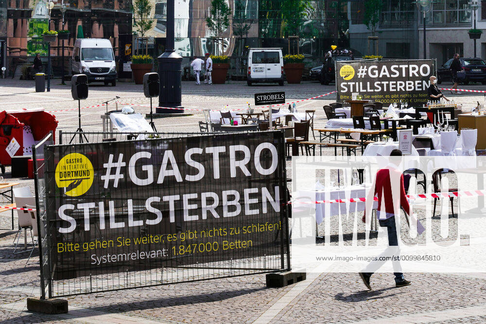 Empty tables, chairs and beds at Friedensplatz in Dortmund Following an appeal by Dehoga Deutscher Hotel und Gaststättenverband, catering businesses have joined forces under the motto STILLSTERBEN to take part in the protest action, with which they draw attention to the situation of their businesses to the consequences of the Corona restrictions in the Corona crisis