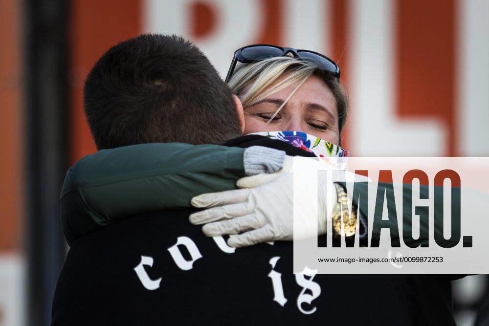 Two people hugging each other at the closed border between Zgorzelec and Goerlitz, 24 04 2020 In order to contain the coronavirus, Poland and the Czech Republic, among others, have closed their borders to Germany in mid-March The background to the protest is the current restricti