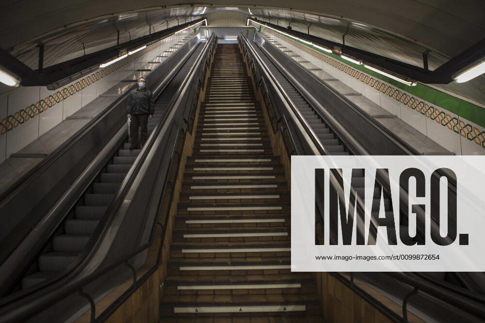 A man using the empty access escalators of the Madrid Metro Station during the covid 19 crisis..Day 41 of the state of alarm due to the Coronavirus health crisis. Spain has had more than 200,000 confirmed cases of COVID-19 and over 20,000 reported deaths. Daily deaths from coronavirus have dropped in the last 24 hours to 367, the lowest rate in a month. Madrid Spain - ZUMAs197 20200424_zaa_s197_117