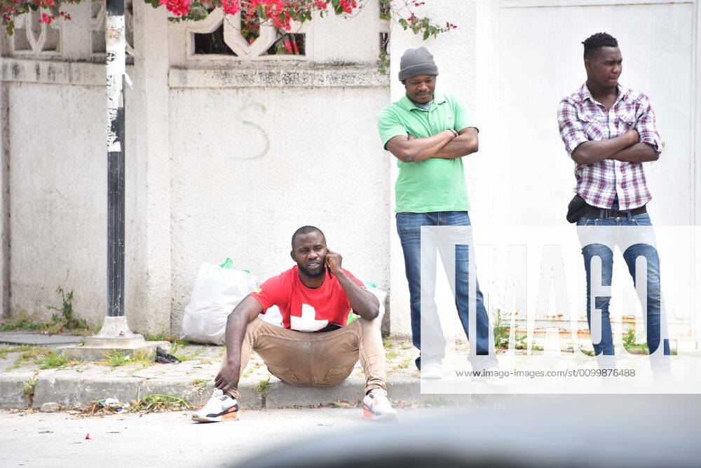 African immigrants wait for aid packages distributed by the municipality of Kram on April 24, 2020 in Tunis, Tunisia. African immigrants affected by new type of coronavirus precautions (Covid-19) in Tunisia NEWS : Covid 19 Coronavirus en Tunisie - Tunis - 24 04 2020 WASSIMJDIDI PANORAMIC