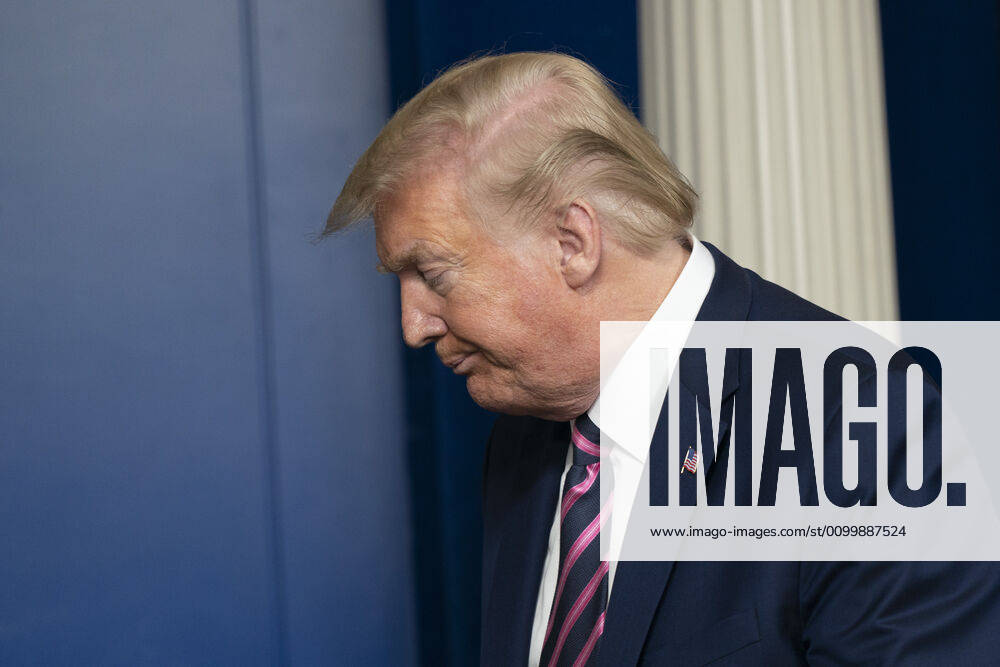 United States President Donald Trump departs after participating in a news briefing with members of the Coronavirus Task Force at the White House in Washington, DC on April 24, 2020. .Credit: Pool via CNP Washington USA - ZUMAs152 20200424_zaa_s152_082