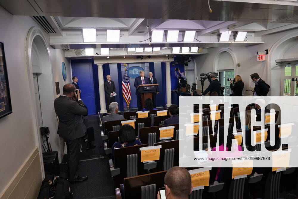 United States President Donald Trump participates in a news briefing with members of the Coronavirus Task Force at the White House in Washington, DC on April 24, 2020. Standing with the President are Stephen Hahn, Commissioner, US Food and Drug Administration (FDA), left, and US Vice President Mike Pence, right Washington USA - ZUMAs152 20200424_zaa_s152_096