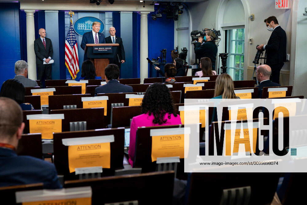 President Donald J. Trump, joined by Vice President Mike Pence and Commissioner of Food and Drugs Dr. Stephen Hahn, delivers remarks during a coronavirus update briefing Friday, April 24, 2020, in the James S. Brady Press Briefing Room of the White House..People: President Donald Trump. Washington United States Of America - ZUMAs214 20200424_zaa_s214_005