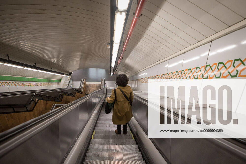 A woman using the empty access escalators of the Madrid Metro Station during the covid 19 crisis..Day 41 of the state of alarm due to the Coronavirus health crisis. Spain has had more than 200,000 confirmed cases of COVID-19 and over 20,000 reported deaths. Daily deaths from coronavirus have dropped in the last 24 hours to 367, the lowest rate in a month. Madrid Spain - ZUMAs197 20200424_zaa_s197_210