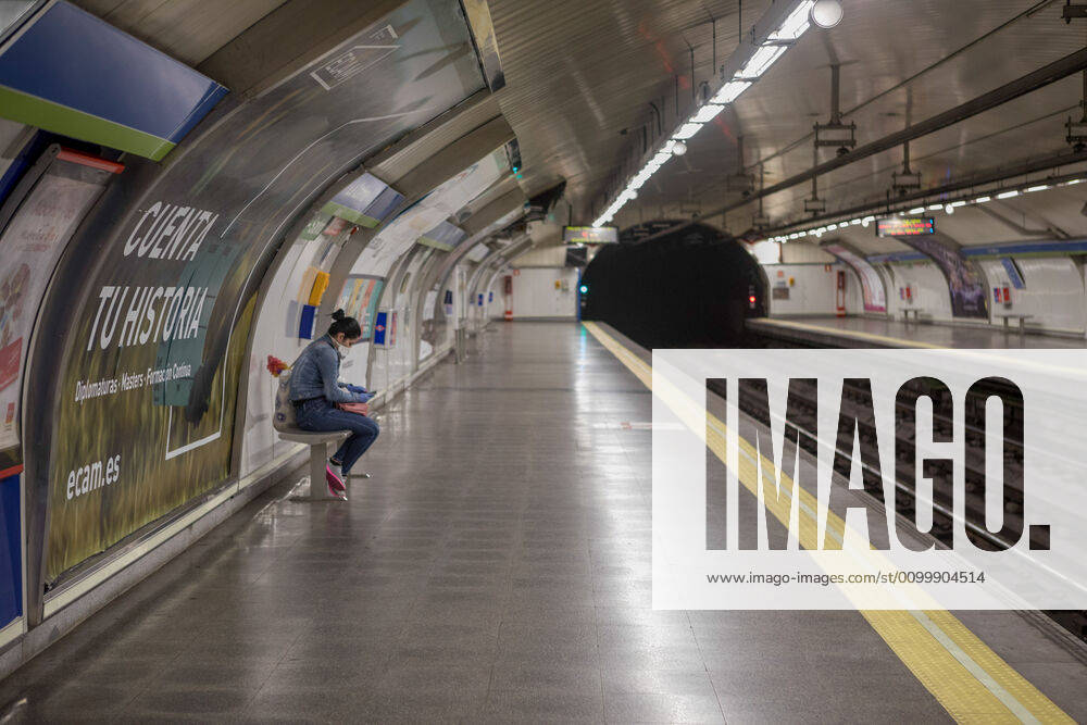 A woman waiting for a train at an empty Metro Station during the covid 19 crisis..Day 41 of the state of alarm due to the Coronavirus health crisis. Spain has had more than 200,000 confirmed cases of COVID-19 and over 20,000 reported deaths. Daily deaths from coronavirus have dropped in the last 24 hours to 367, the lowest rate in a month. Madrid Spain - ZUMAs197 20200424_zaa_s197_214