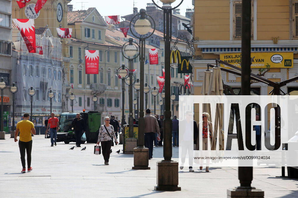 As traders prepare window displays to open, citizens stroll through Korzo 25.04.2020., Croatia, Rijeka - Numerous citizens walked through Korzo. Shops are setting up shop windows ahead of opening next week. GoranxKovacic PIXSELL