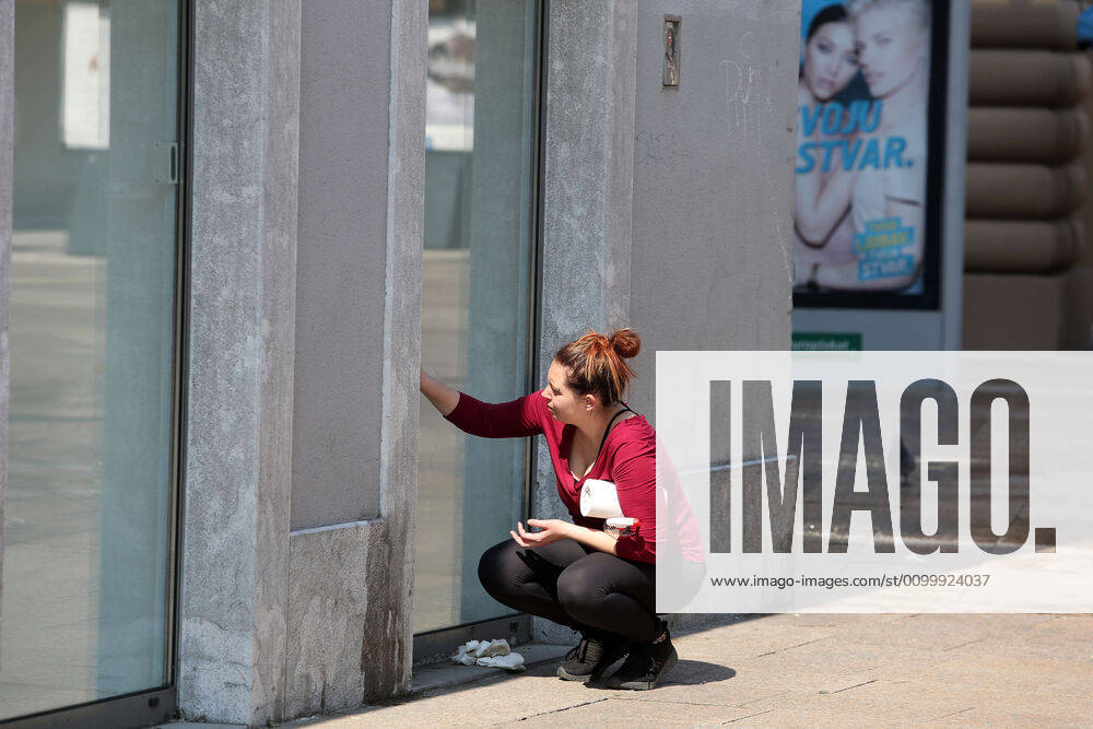 As traders prepare window displays to open, citizens stroll through Korzo 25.04.2020., Croatia, Rijeka - Numerous citizens walked through Korzo. Shops are setting up shop windows ahead of opening next week. GoranxKovacic PIXSELL