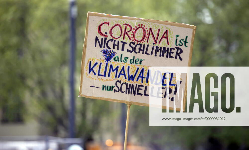 DEU, Germany, Baden Württemberg, Stuttgart, 24 04 2020 Impact of the Corona Crisis Fridays for Future, the protest of youth against climate policy, took their protests with tentative actions back on protest sign Corona is not worse than climate change only faster