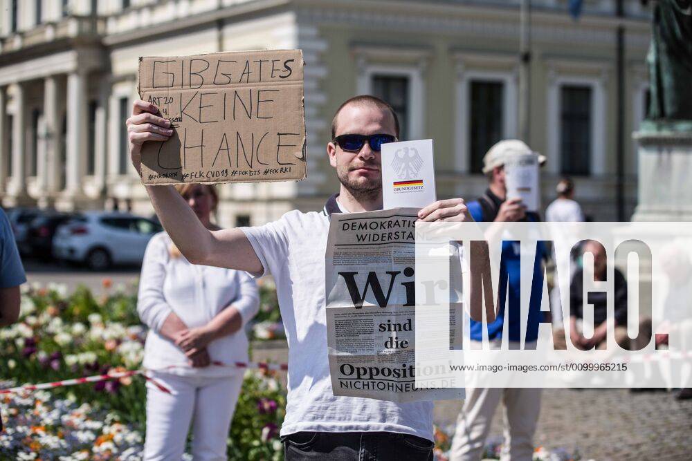 We are the opposition from an anti-state, far-right grouping along with Give Bill Gates no chance held during a QAnon-like demo in Munich, Germany. Organized in Telegram chats by conspiratorial â€oeQuerfront†(cross-front) groups, the city of Munich, Germany saw numerous QAnon-like, â€oeCorona Parties†as under mottos such as â€oeDemonstration fuer die Erhaltung der Grundrechte†(Demonstration for the Upholding of Basic Rights) and â€oeFuer unsere Freiheit, unsere Grundrechte und unsere Selbstbestimmung†(Demonstration for our Freedom, Basic Rights, and Self-Determination). Numerous right-extremists, Verfassungsschutz-monitored figures, QAnon fans, and AfD politicians were in attendance. The groups are of the belief that the anti-Coronavirus measures - ZUMAb160 20200425_zbp_b160_008
