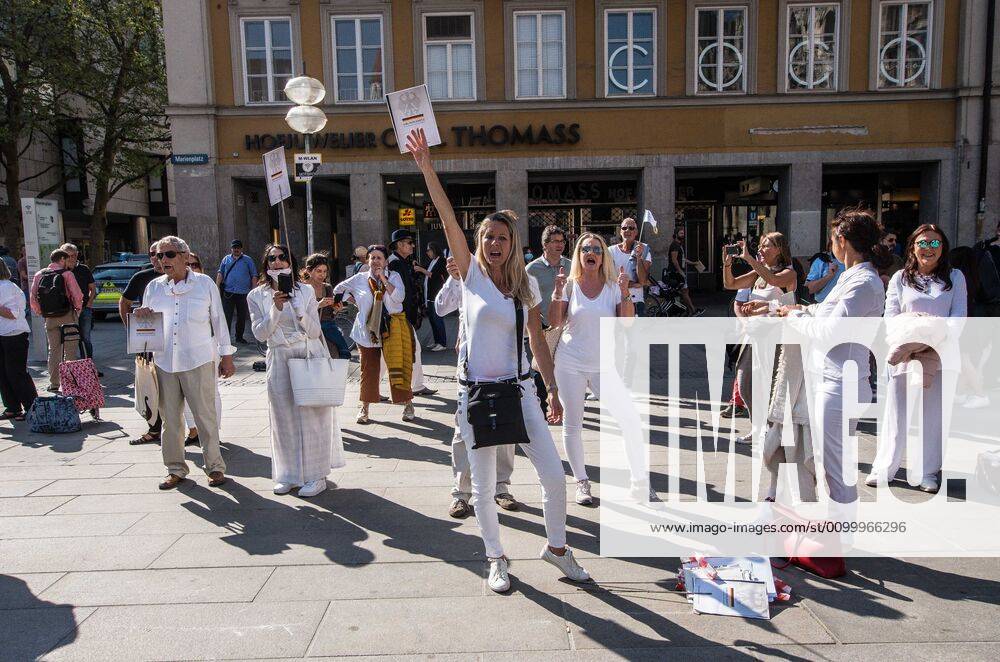 Sina Bodden leading her bloc at a QAnon-like demo at Marienplatz, Munich, Germany. Organized in Telegram chats by conspiratorial â€oeQuerfront†(cross-front) groups, the city of Munich, Germany saw numerous anti-state â€oeCorona Parties†as under mottos such as â€oeDemonstration fuer die Erhaltung der Grundrechte†(Demonstration for the Upholding of Basic Rights) and â€oeFuer unsere Freiheit, unsere Grundrechte und unsere Selbstbestimmung†(Demonstration for our Freedom, Basic Rights, and Self-Determination). Numerous right-extremists, Verfassungsschutz-monitored figures, QAnon fans, and AfD politicians were in attendance. The groups are of the belief that the anti-Coronavirus measures are power-grabs. Querfront groups are often a mix of political outliers, - ZUMAb160 20200425_zbp_b160_067