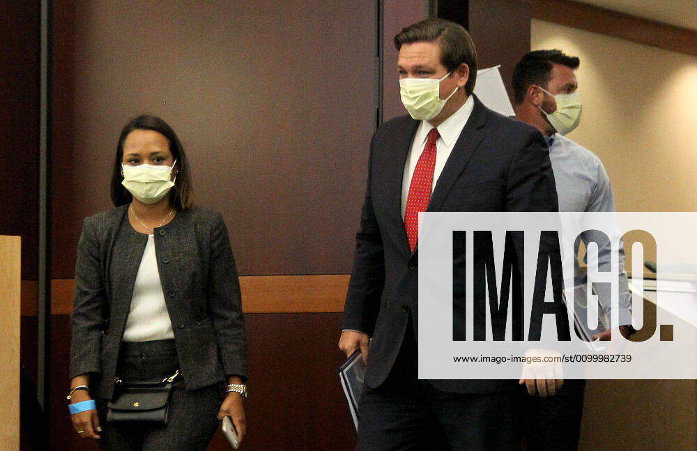 Florida Gov. Ron De Santis, right, arrives at a news conference regarding COVID-19 at the Florida Cleveland Clinic in Weston, Fla., on Saturday, April 25, 2020. Weston USA - ZUMAm67_ 20200425_zaf_m67_001