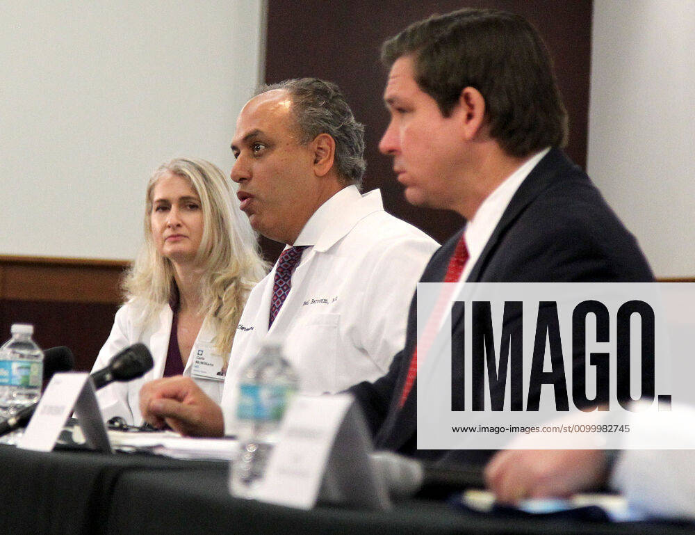 Florida Gov. Ron De Santis, right, looks on as Dr. Wael Barsoum, MD, CEO & President Cleveland Clinic Florida, speaks during a news conference regarding COVID-19 at the Florida Cleveland Clinic in Weston, Fla., on Saturday, April 25, 2020. Weston USA - ZUMAm67_ 20200425_zaf_m67_004