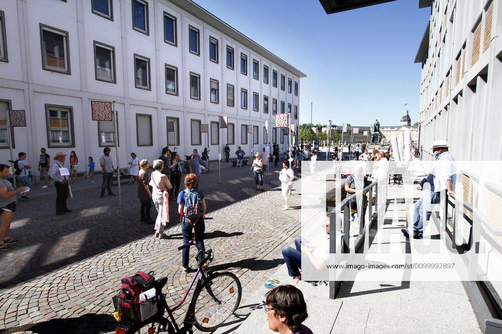 An approved demonstration, limited to a few participants, against the corona-related infection protection law and the associated restrictions on freedom took place in the city centre of Karlsruhe, Baden Württemberg, Germany