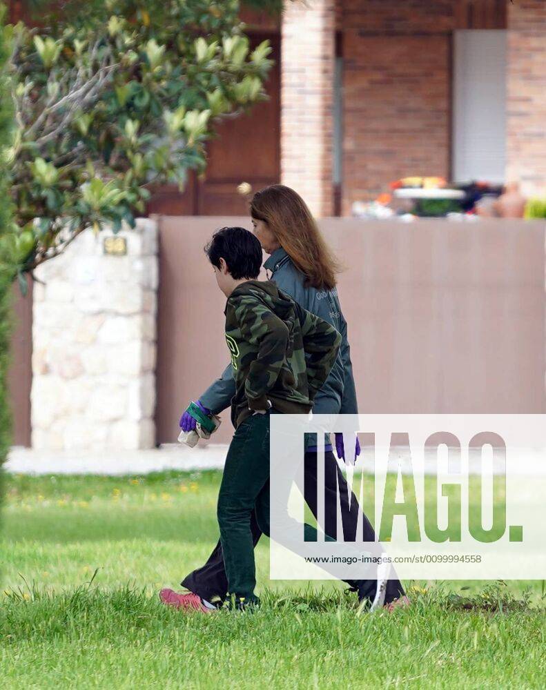 A family walks past the Madrid Street after restrictions were partially lifted for children for the first time in six weeks, during the coronavirus disease COVID 19 outbreak in Madrid, Spain, April 26, Cordon Press