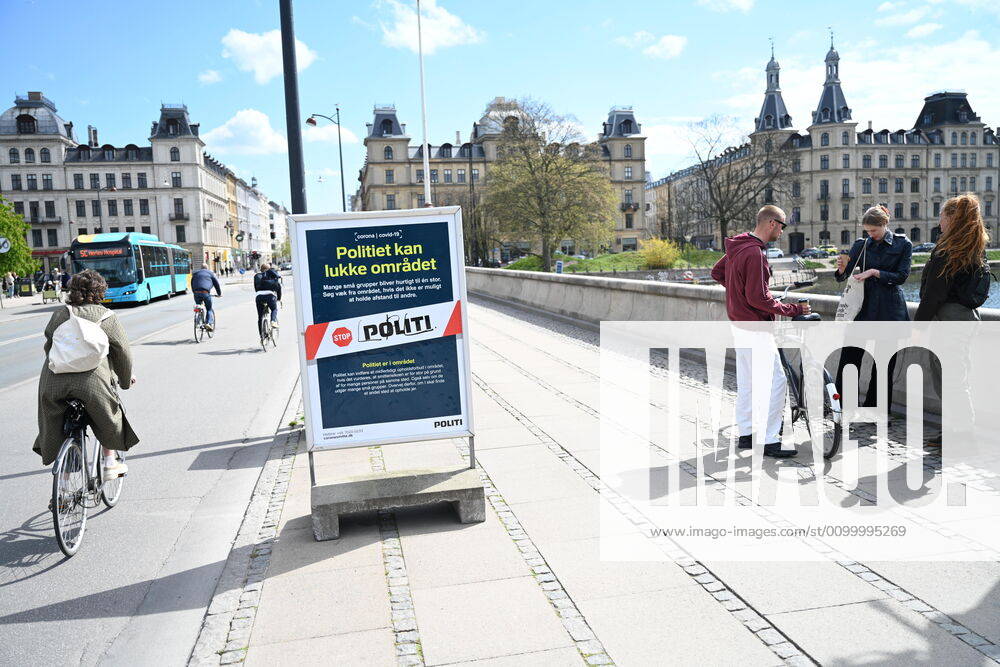 Copenhageners enjoy the spring sun at Queen Louises Bridge in Copenhagen on Sunday, April 26, 2020 There is a ban on assembly of over ten people because of the danger of infection with coronavirus covid 19, Copenhagen,
