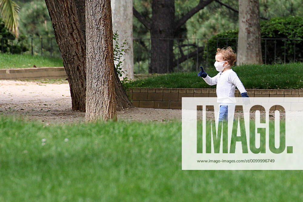 A kid plays in a park of Madrid during the first day of permission so that the children can spend an hour daily on the street during the health crisis due to the Covid-19 virus pandemic - Coronaviruss. April 26,2020. (2020042676)
