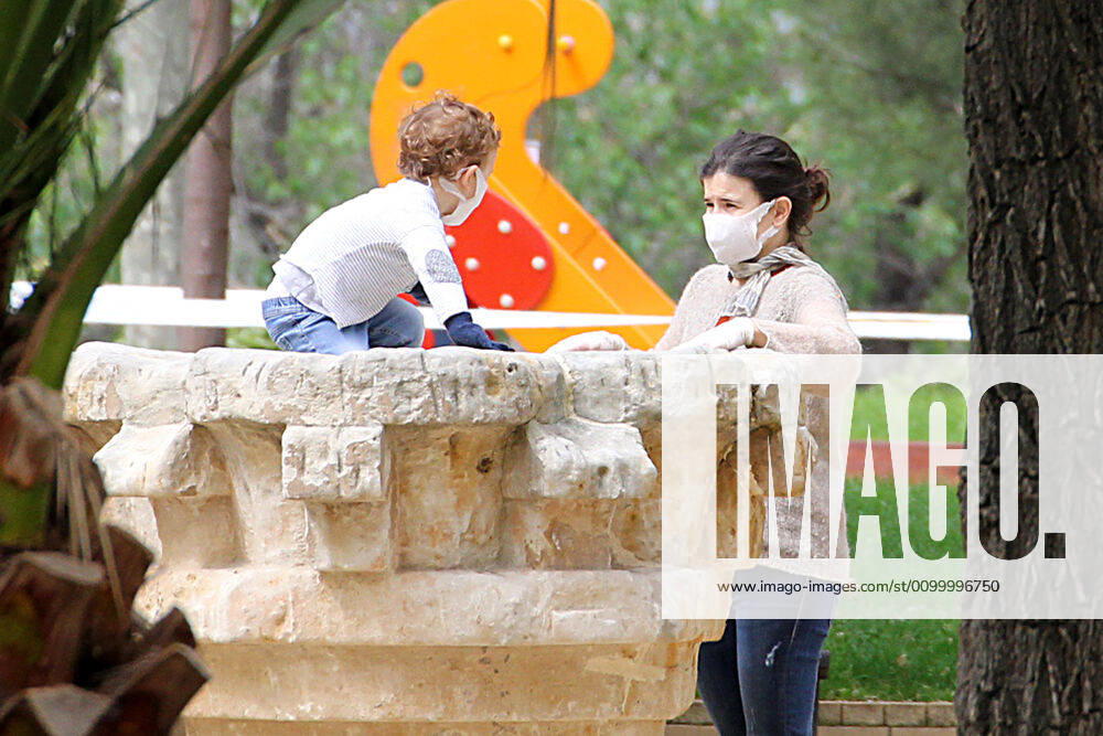 A mother and her son play in a Madrid park during the first day of permission so that the children can spend an hour daily on the street during the health crisis due to the Covid-19 virus pandemic - Coronaviruss. April 26,2020. (2020042679)