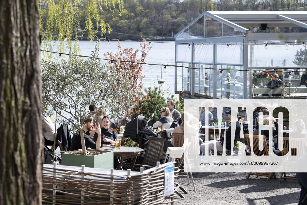 People enjoy the spring weather at an outdoor restaurant in Stockholm, Sweden April 26, 2020 STOCKHOLM SWEDEN