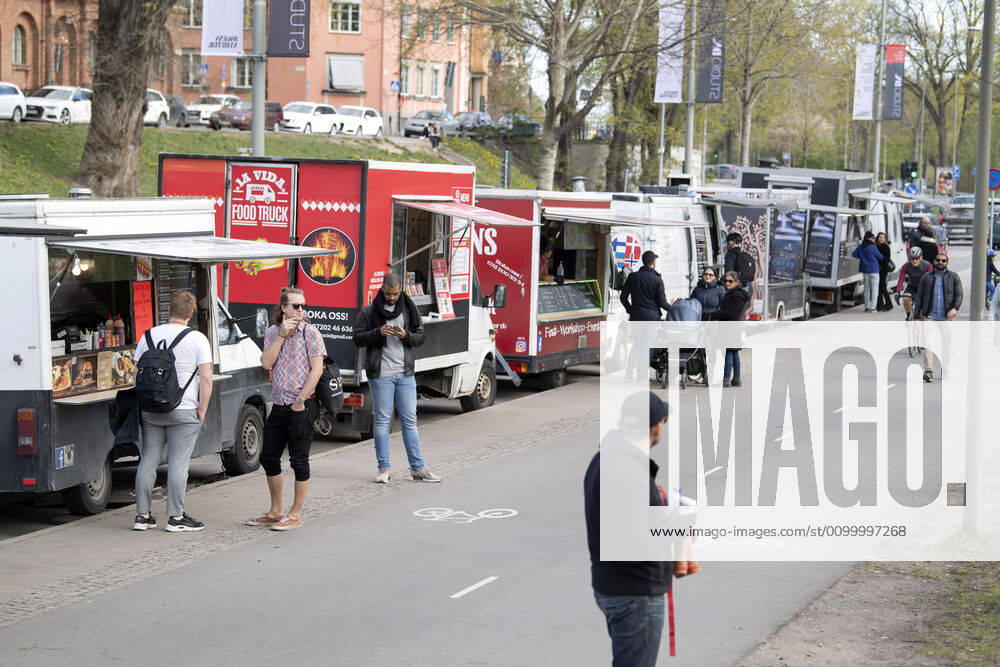 People buy food from food trucks in Stockholm, Sweden April 26, 2020 STOCKHOLM SWEDEN