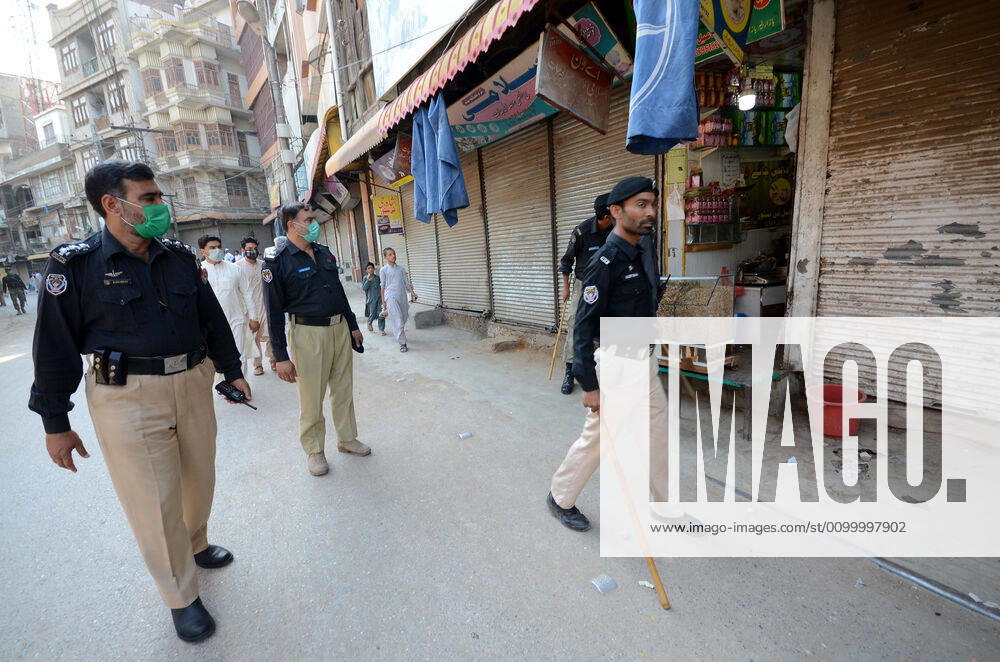 Pakistan: Police officials closing shops Police officials closing shops in the city for precautionary measures to prevent corona virus. Authorities appealed for people to avoid public gatherings to curb the spread of the corona virus and close shops until four o clock in the month of Ramadan. Peshawar Khyber Pakhtunkhwa Pakistan