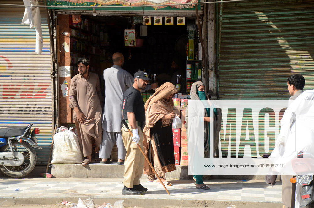 Pakistan: Police officials closing shops Police officials closing shops in the city for precautionary measures to prevent corona virus. Authorities appealed for people to avoid public gatherings to curb the spread of the corona virus and close shops until four o clock in the month of Ramadan. Peshawar Khyber Pakhtunkhwa Pakistan