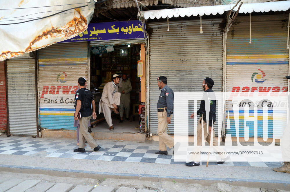 Pakistan: Police officials closing shops Police officials closing shops in the city for precautionary measures to prevent corona virus. Authorities appealed for people to avoid public gatherings to curb the spread of the corona virus and close shops until four o clock in the month of Ramadan. Peshawar Khyber Pakhtunkhwa Pakistan