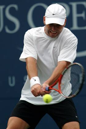 Andre Agassi (USA) - beidhändige Rückhand Tennis Herren US Open 2003, ATP-Tour, Grand Slam, Vdig Einzelbild Flushing Meadows New York Dynamik,