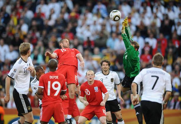 Football - 2010 FIFA World Cup - 2nd Round - Germany vs. England England s Matthew Upson (4th L) scores their first goal to take the score to 2-1 against Manuel Neuer of Germany (R) at the Free State Stadium, Bloemfontein  o0 Tor