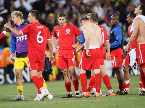 England s Steven Gerrard (C) looks on dejected FIFA World Cup 2010 Round of 16 Germany v England 27th June, 2010 EDITORIAL USE ONLY. No use with unauthorised audio, video, data, fixture lists, club league logos or live services. Online in-match use limited to 120 images, no video emulation. No use in betting, games or single club league player publications.