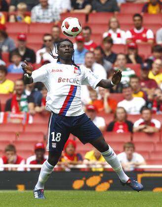 Football - Emirates Cup - AC Milan v Olympique Lyonnais Bafetimbi Gomis of Lyon at Emirates Stadium