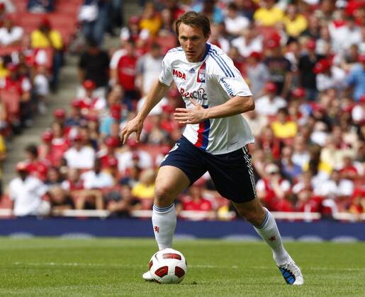 Football - Emirates Cup - AC Milan v Olympique Lyonnais Kim Källström of Lyon at Emirates Stadium