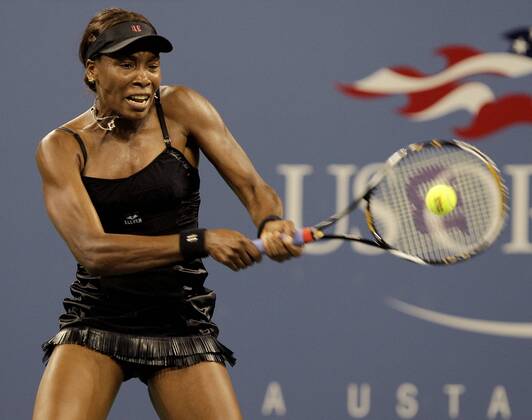 Venus Williams of the USA hits a backhand  NYP20100830119