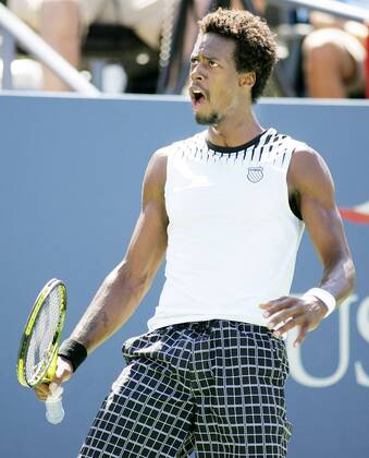Gael Monfils of France country man Richard Gasquet during fourth-round action at the U.S. Open held at the National Tennis Center on September 6, 2010 in New York.  NYP20100906312