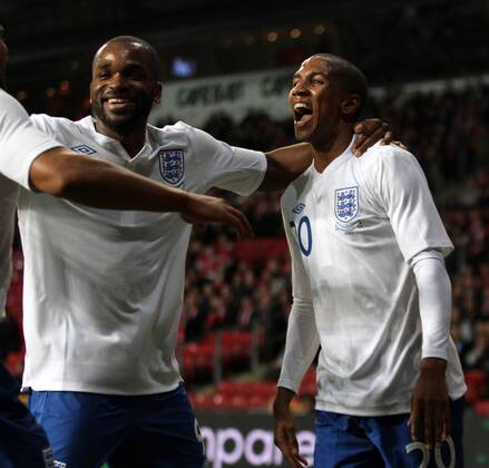 Englands Ashley Young (R) celebrates scoring his sides second goal with Darren Bent International Friendly Denmark v England 9th February, 2011 EDITORIAL USE ONLY. No use with unauthorised audio, video, data, fixture lists, club league logos or live services. Online in-match use limited to 120 images, no video emulation. No use in betting, games or single club league player publications.
