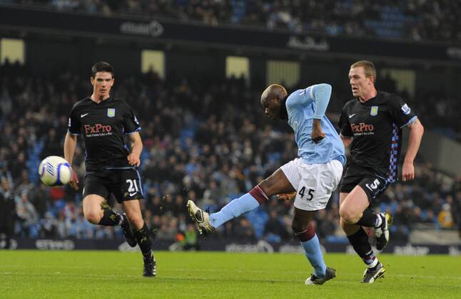 Mario Balotelli of Manchester City scores the second goal EON FA Cup 5th Round Manchester City (blue) v Aston Villa (black) 2nd March, 2011 EDITORIAL USE ONLY. No use with unauthorised audio, video, data, fixture lists, club league logos or live services. Online in-match use limited to 120 images, no video emulation. No use in betting, games or single club league player publications.