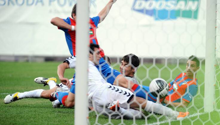 Champions League 2. qualification match Viktoria Pilsen against Pyunik Yerevan on July 19, 2011 in Pilsen, Czech Republic. Pictured Varazdat Haroyan, Milan Petrzela, Karen Israelyan. (CTKxPhoto PavelxRakusan)  CTKPhoto8201107190367401