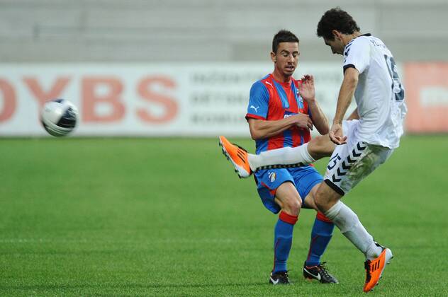 Champions League 2. qualification match Viktoria Pilsen against Pyunik Yerevan on July 19, 2011 in Pilsen, Czech Republic. Pictured Artur Yuspashyan, Milan Petrzela. (CTKxPhoto PavelxRakusan)  CTKPhoto201107190368901