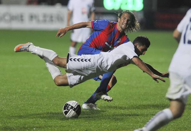 Champions League 2. qualification match Viktoria Pilsen against Pyunik Yerevan on July 19, 2011 in Pilsen, Czech Republic. Pictured Petr Jiracek, Gagik Pogosjan. (CTKxPhoto PetrxEret)  CTKPhoto4201107190989401