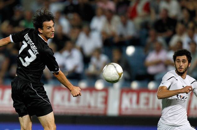 FUSSBALL - UEFA CL Quali, Sturm vs Zestafoni GRAZ,AUSTRIA,03.AUG.11 - FUSSBALL - UEFA Champions League, Qualifikation, SK Sturm Graz vs FC Zestafoni. Bild zeigt Thomas Burgstaller (Sturm) und Nikoloz Gelashvili (Zestafoni).