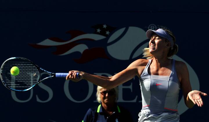 Maria Sharapova of Russia returns the ball during the first round match of women singles at the 2011 US Open Tennis Championships in New York, the United States, August 29, 2011. (Xinhua Shen Hong)(wll) US-NEW YORK-TENNIS-US OPEN-DAY 