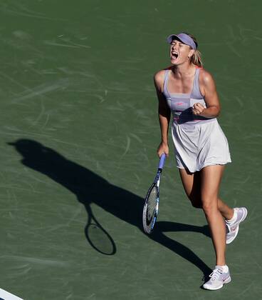 Maria Sharapova of Russia reacts after winning point in the second set of her set victory on day in Arthur Ashe Stadium at the U.S. Open Tennis Championships Stadium in The Billie Jean King National Tennis Center in New York City on August 29, 2011.  NYP20110829119